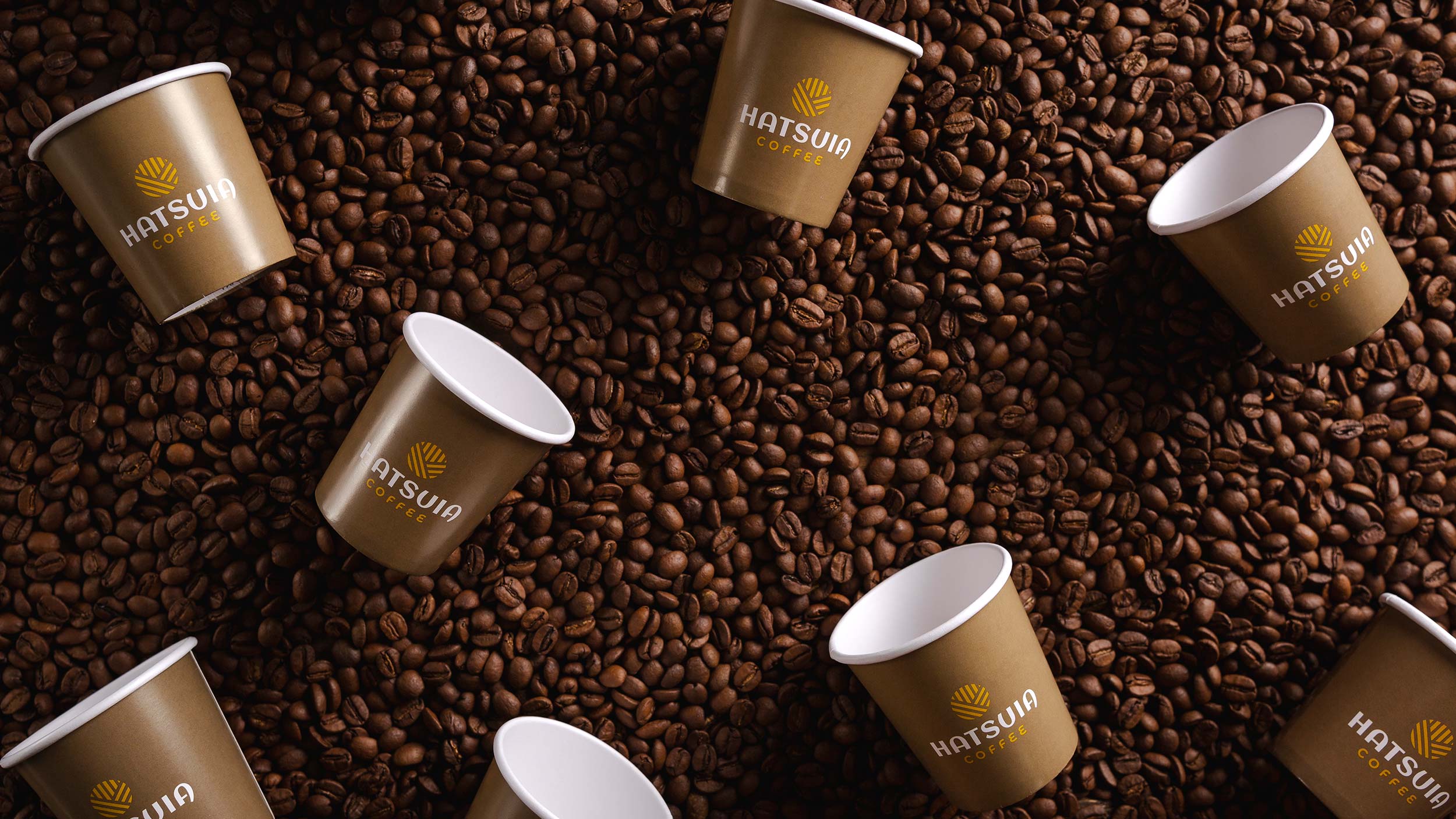 Design de marca e embalagens de Hatsuia Coffee para linha de cafés gourmet e especiais tipo exportação.